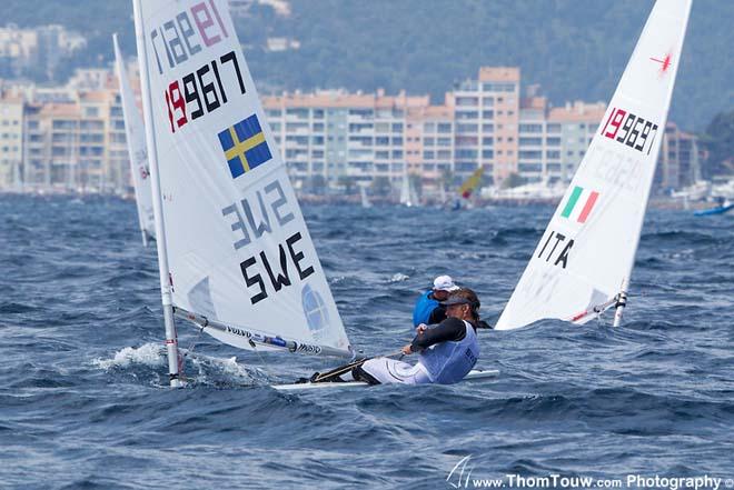 (Left) Jesper Stalheim and (right) Alessio Spadoni - Laser, 2014 ISAF Sailing World Cup Hyeres, day 1 &copy; Thom Touw http://www.thomtouw.com